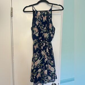 Blue Rain Dress. Beautiful floral, navy lined, elastic waist one button closure.